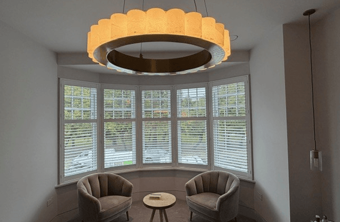 Bespoke wooden shutters for round bay windows